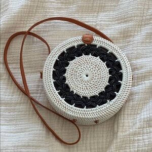 Chic Black and Cream Round Crossbody Bag